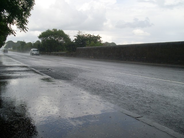 A very wet road after heavy rain
