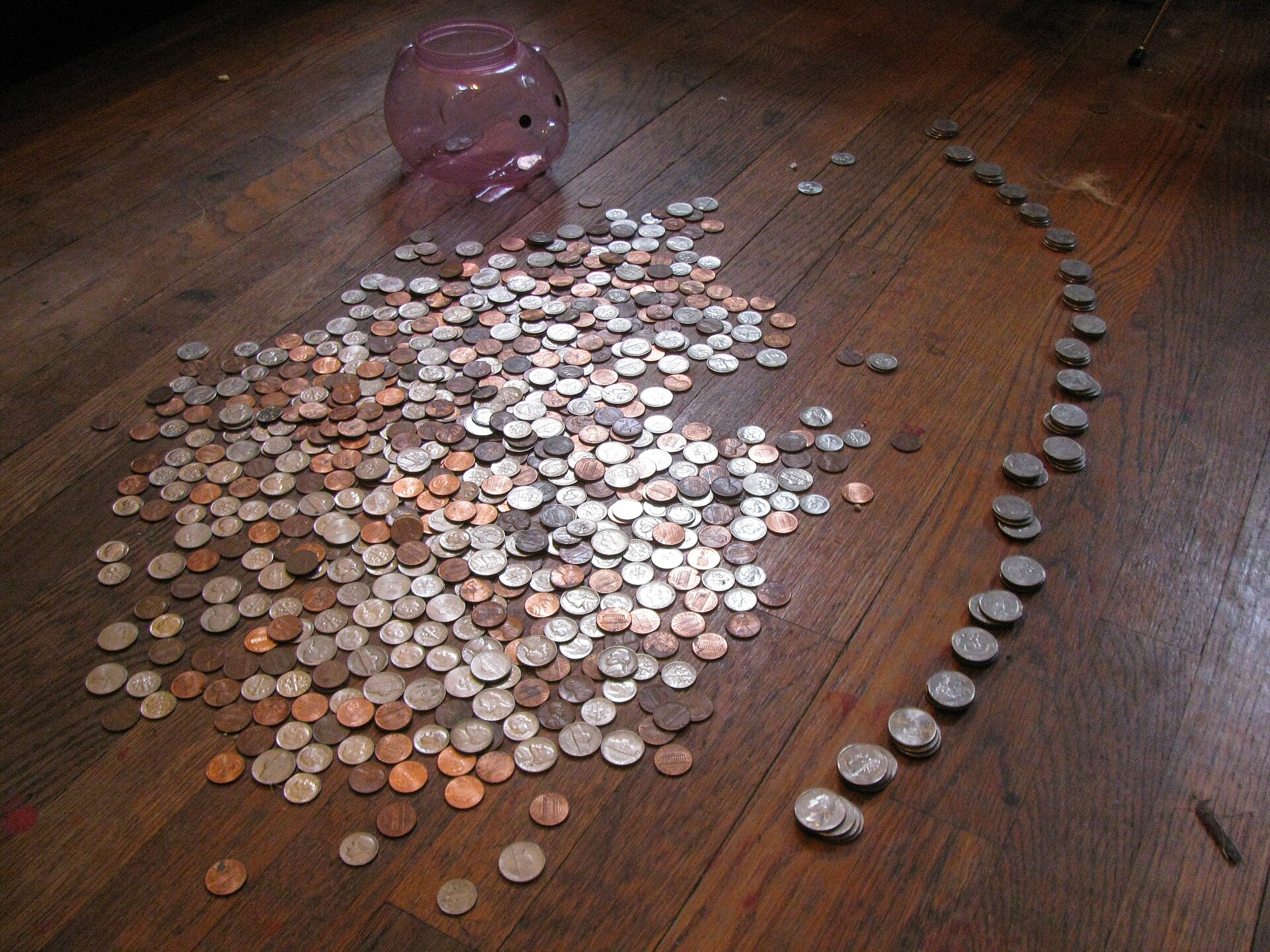 An emptied piggy bank lying on its side