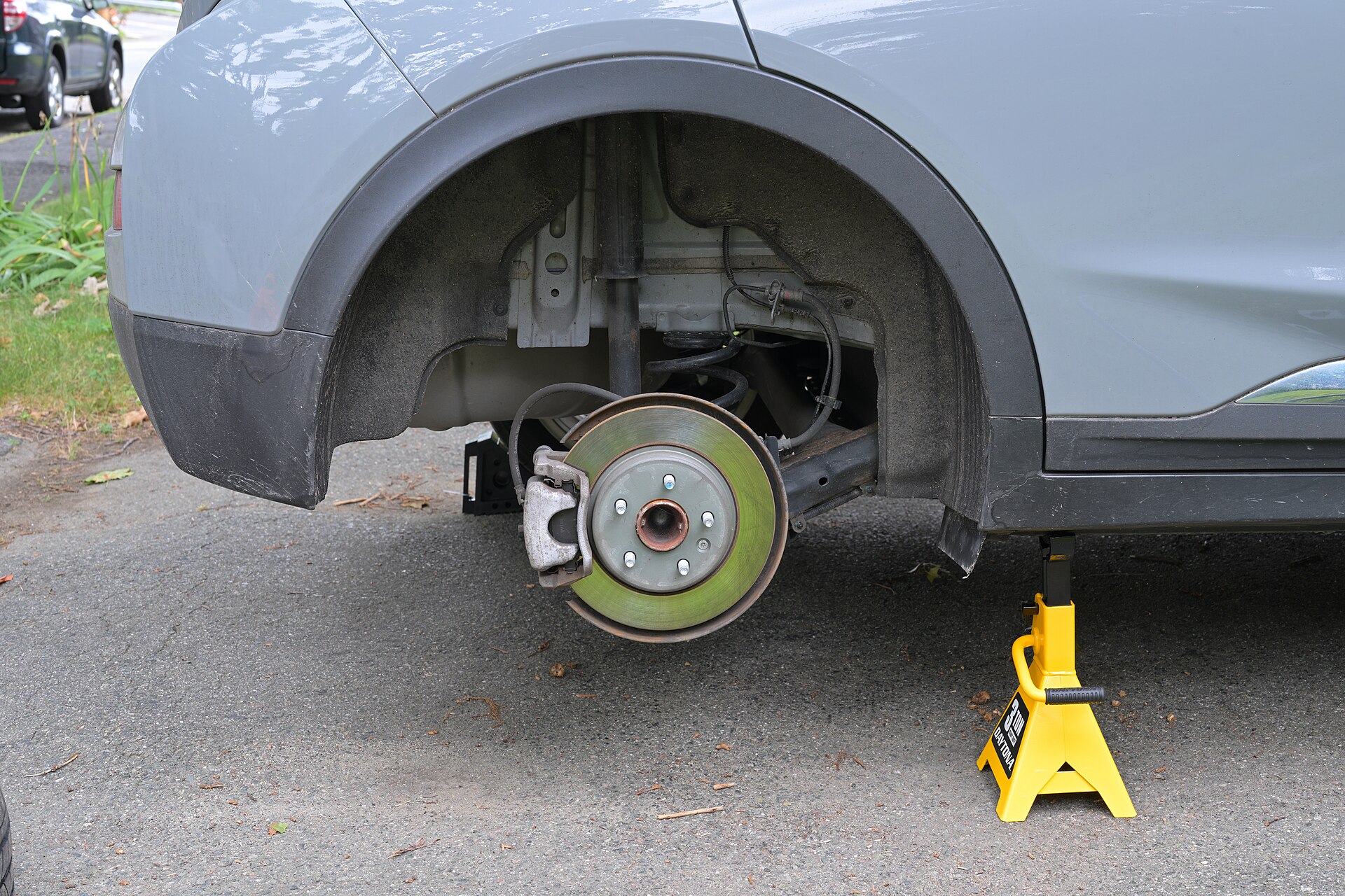 Rear brake disc with surface rust on the friction face