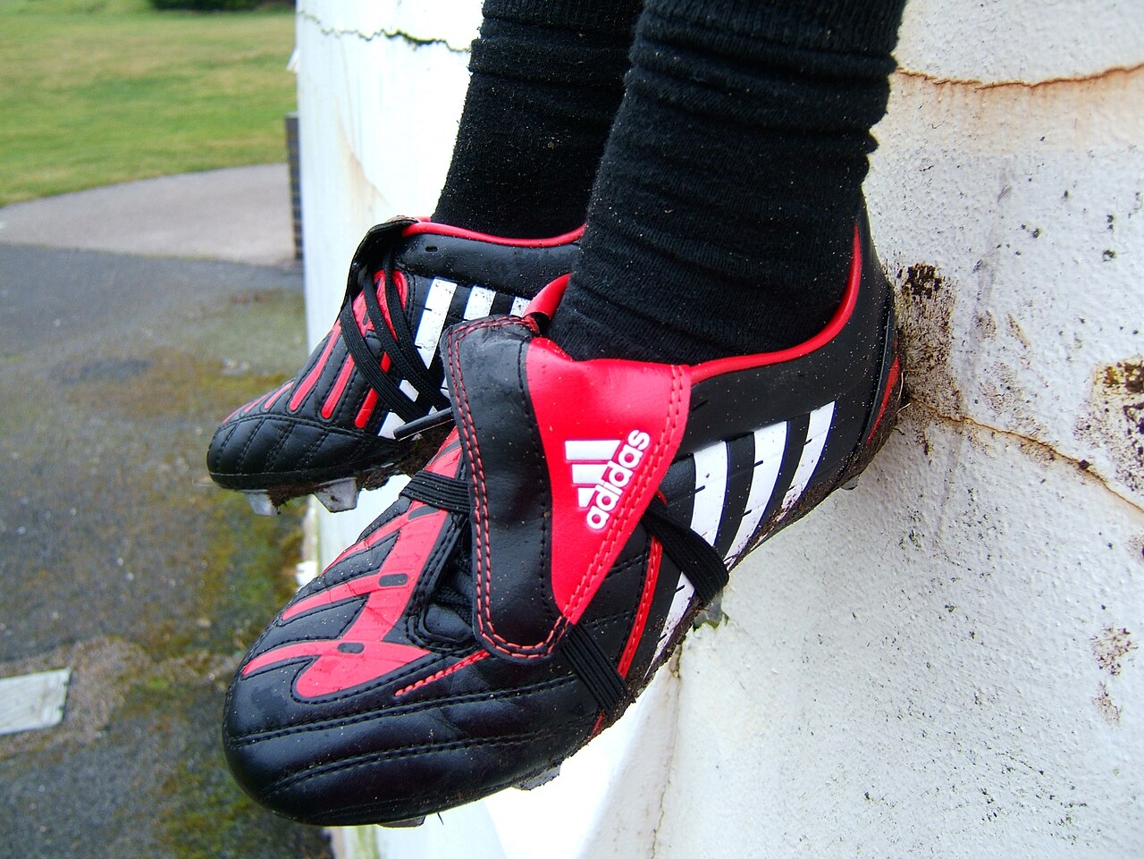 A pair of football boots with studded soles