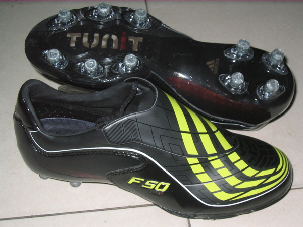 A single football boot showing its studded sole