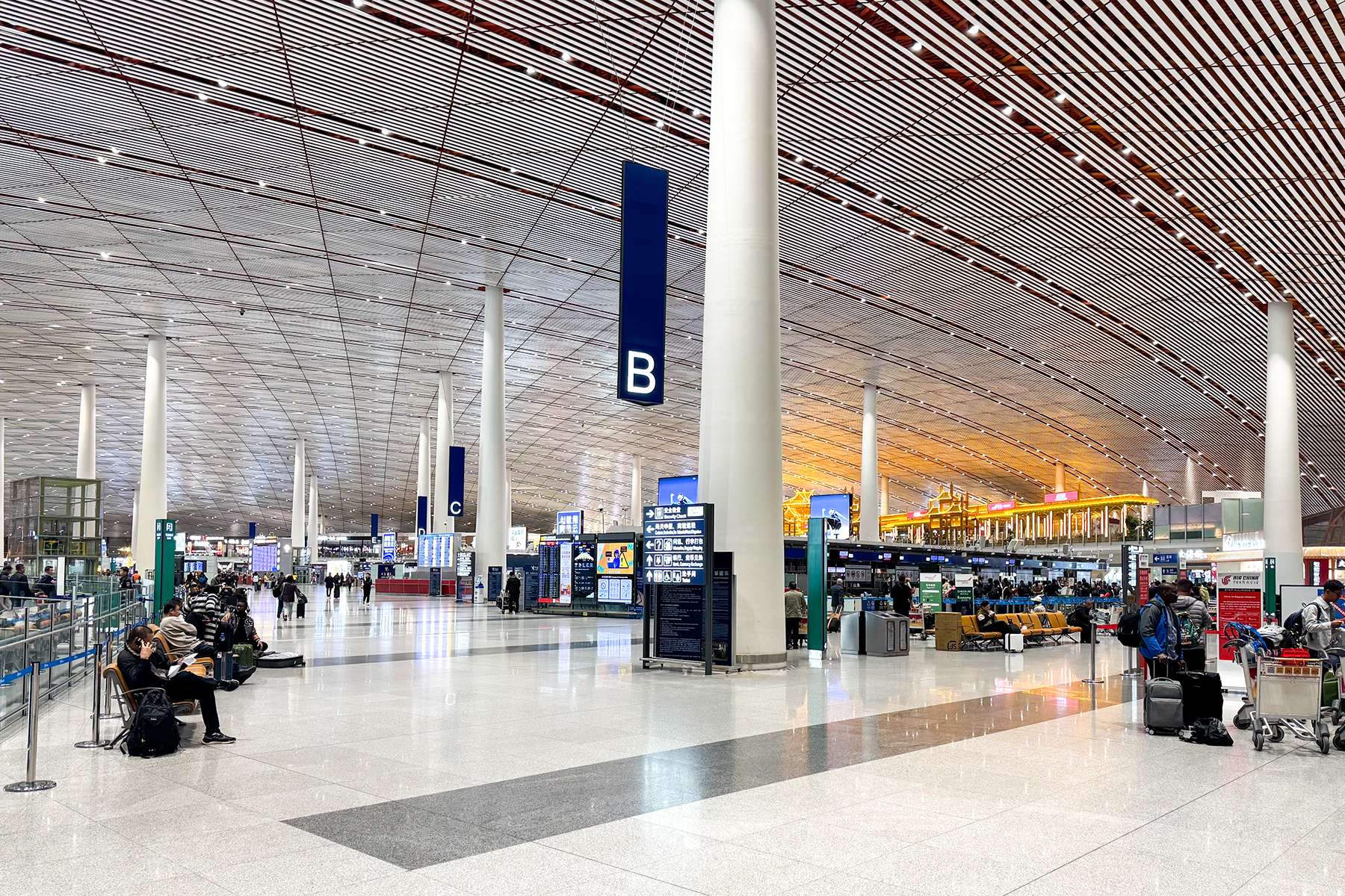 Spacious departure hall of a large international airport terminal
