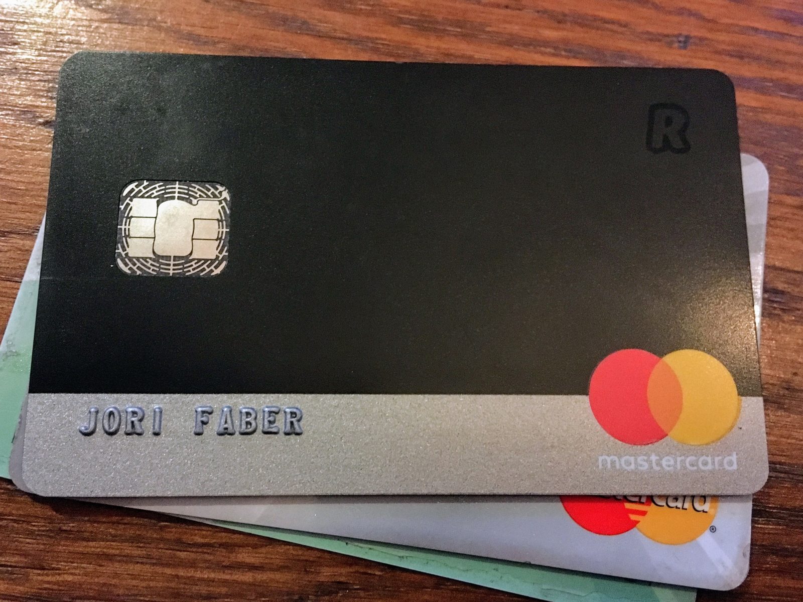 Revolut card held by a hand