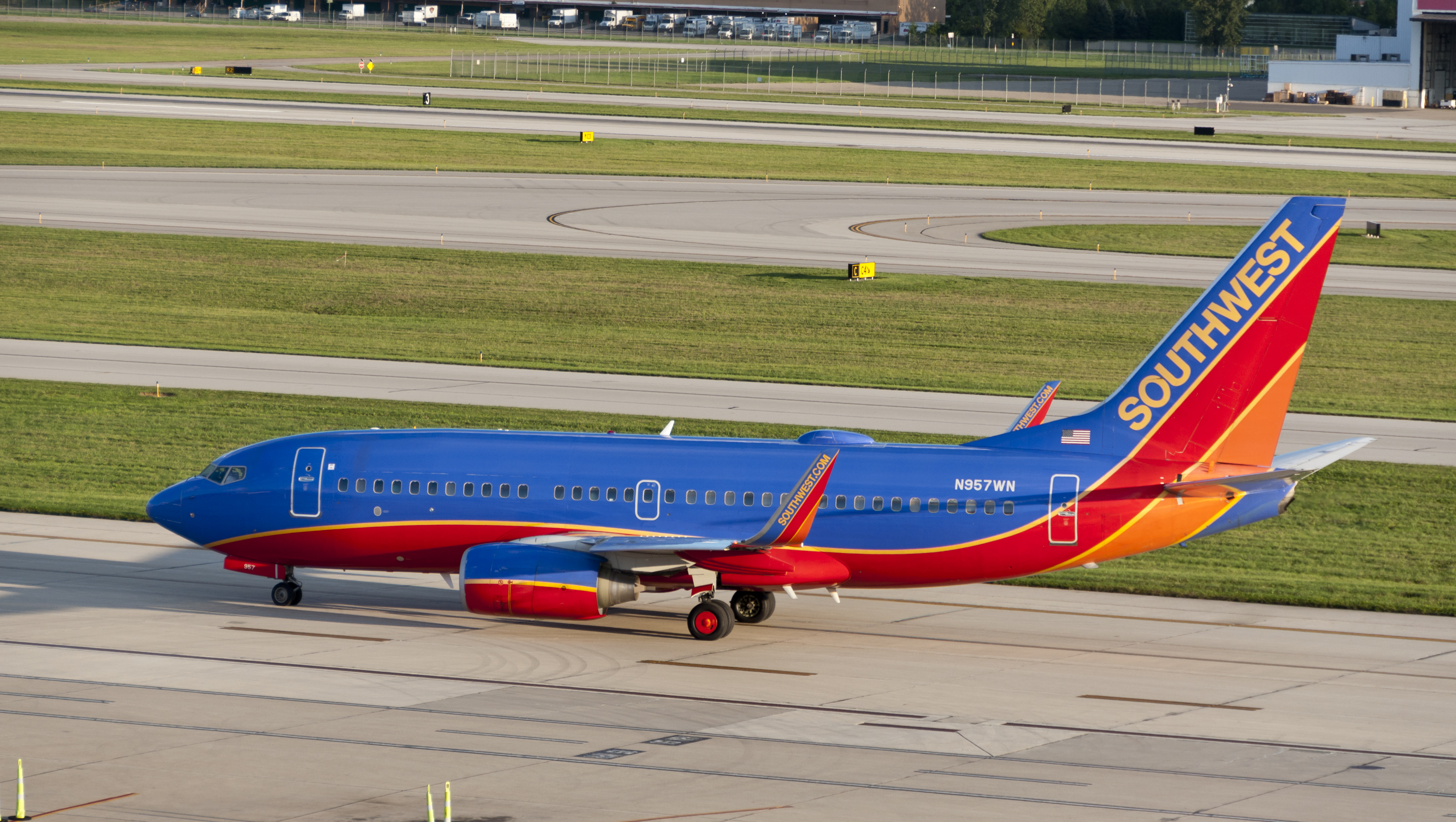 A Southwest Airlines Boeing 737-700 sits at the gate before a flight