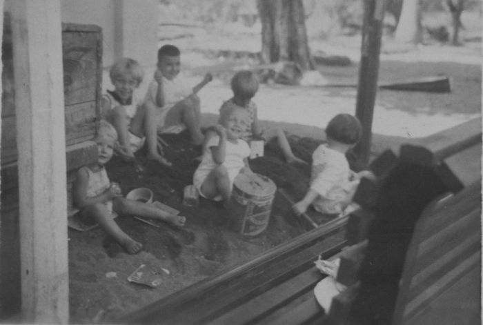 Children playing together in a sandbox