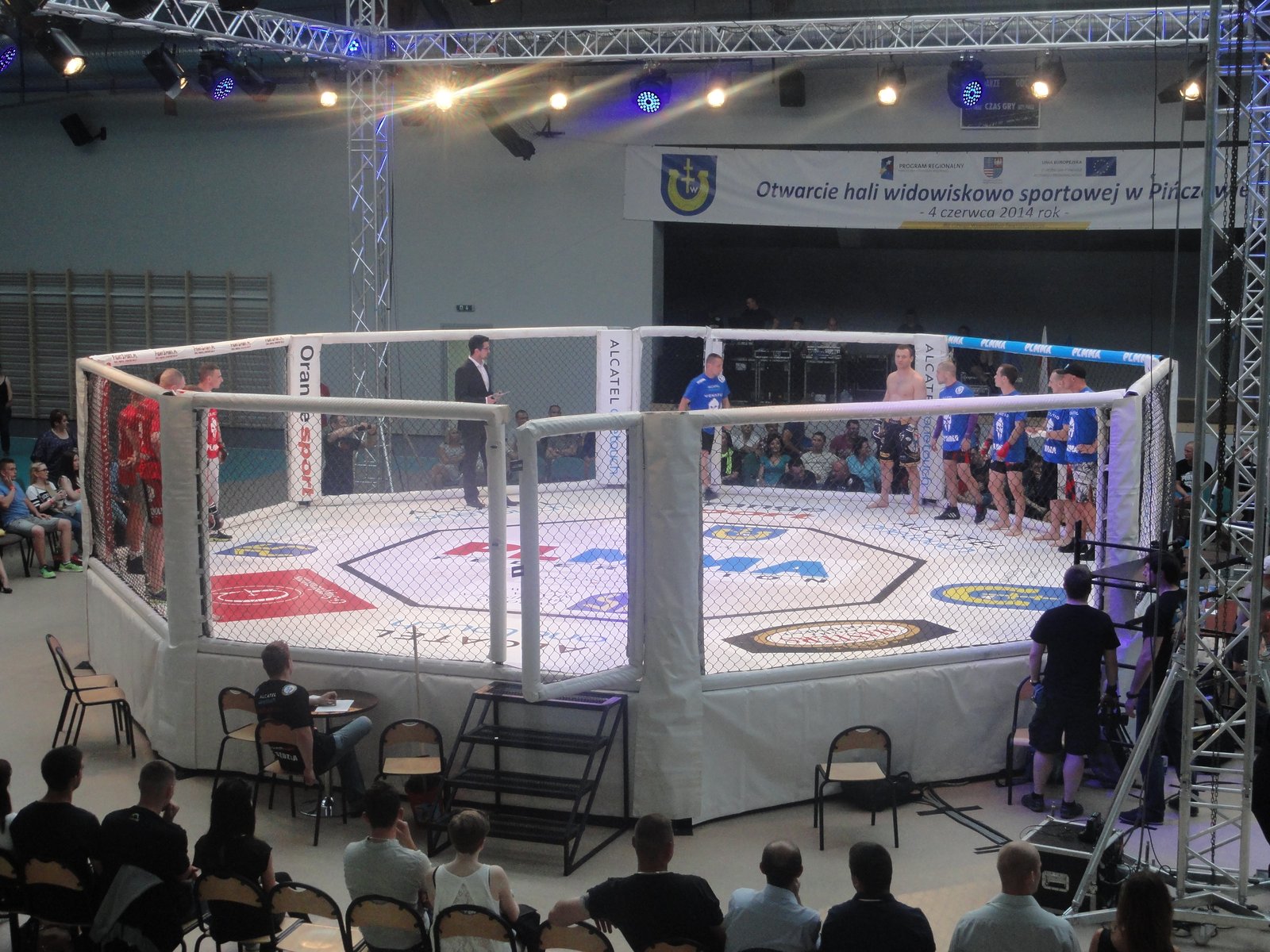 An MMA octagon cage set up for a fight night